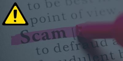 A page that says 'scam' with a pink coloured highlighter written over the top of it and there is a yellow and black warning symbol in the top left hand corner