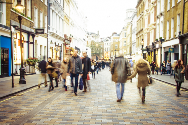 people walking down a street