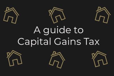 Capital Gains Tax guide, image with gold houses