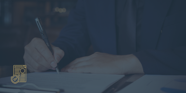 overdue self-assessment liabilities blogs picture. It shows an image of a persons arm holding a fountain pen and writing something on a piece of paper. This image is used to demonstrate liabilities within tax returns.